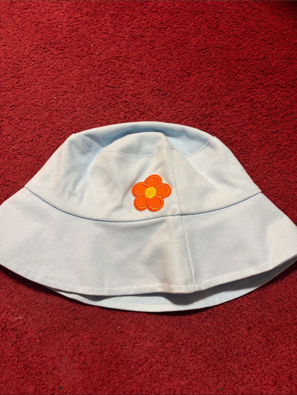 NEVER WORN Princess Polly Light Blue Bucket Hat with Orange Flower Patch